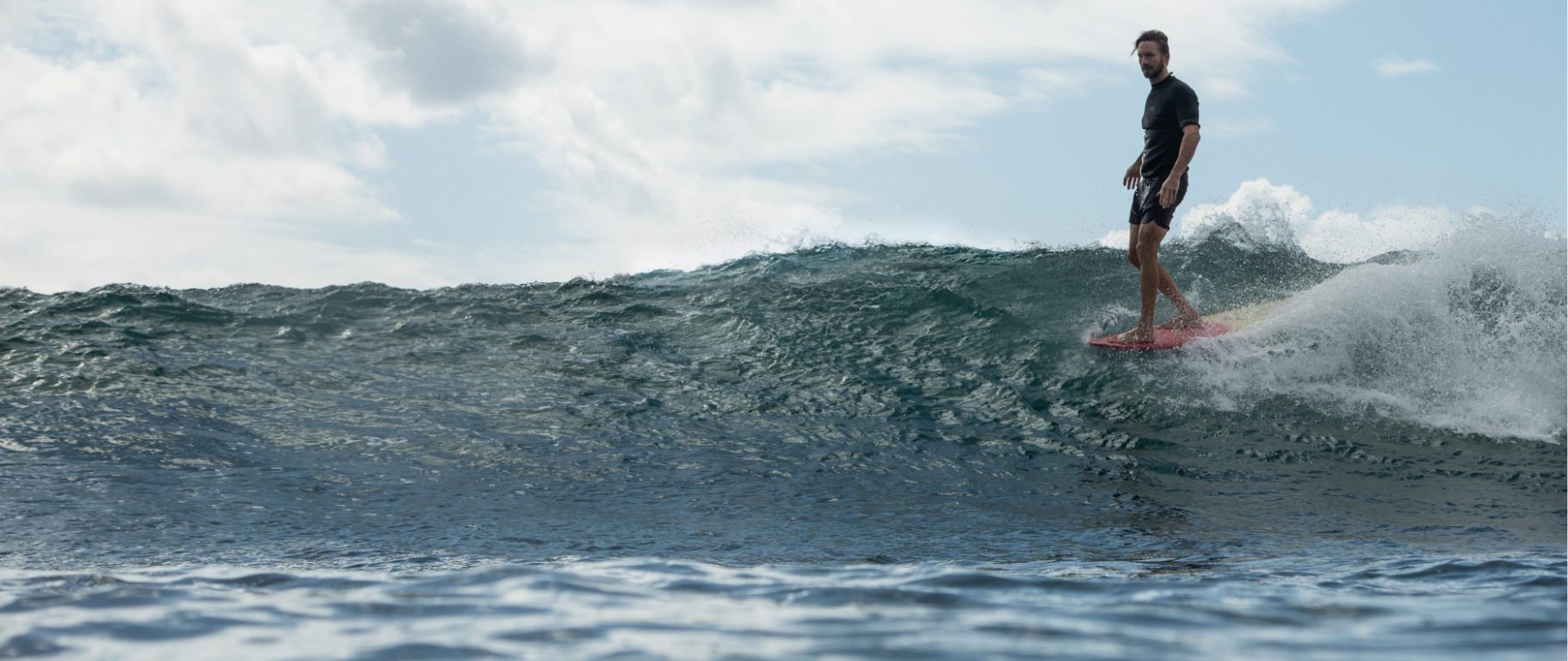 Me surfing a longboard